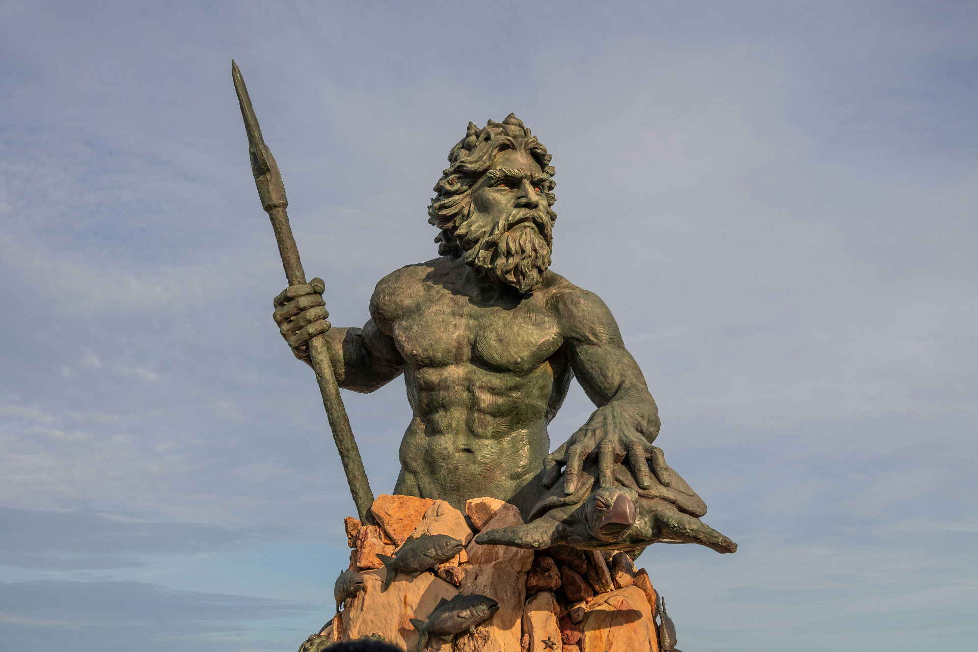 Greek god Poseidon statue symbolizing strength and resilience